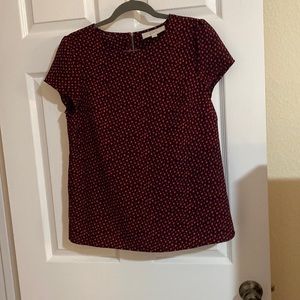 pink dotted black blouse